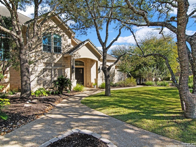 view of front of house with a front lawn