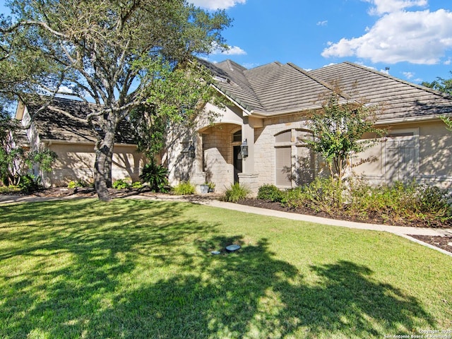 view of front of home with a front yard