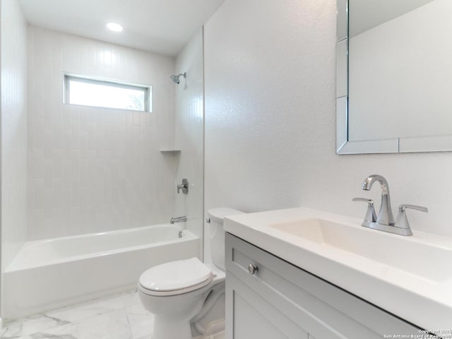 full bathroom with vanity, toilet, and tiled shower / bath combo