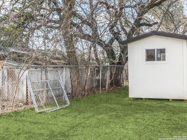 view of yard with a storage shed