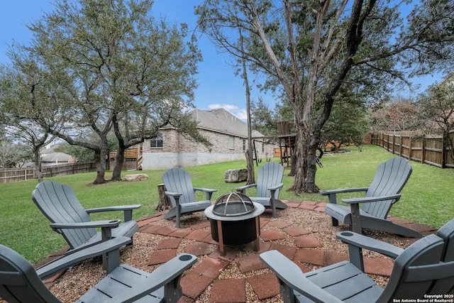 view of patio featuring an outdoor fire pit