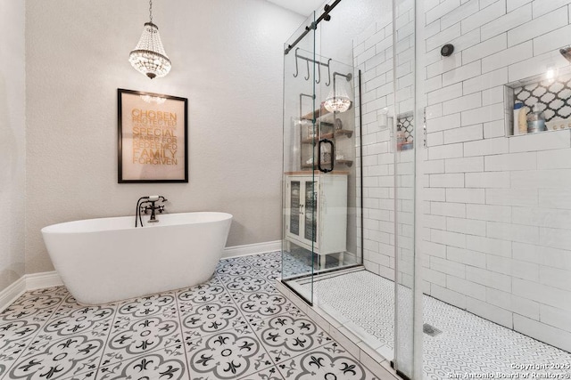 bathroom with separate shower and tub and tile patterned floors