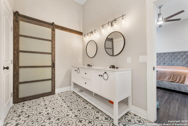 bathroom with vanity and ceiling fan