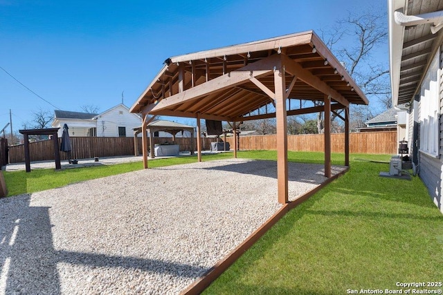 exterior space with a yard, a gazebo, and a patio area