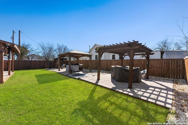 view of yard with a pergola, a gazebo, and a patio area