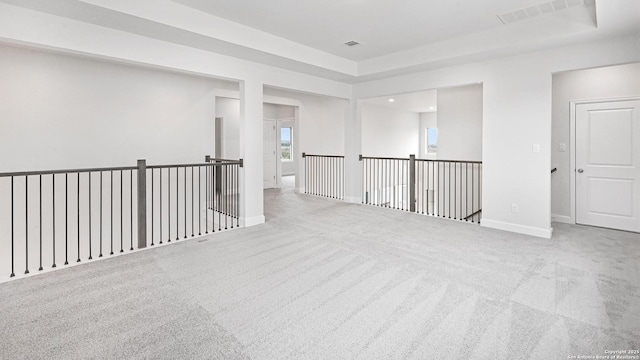 305 Hulda Trl, New Braunfels, TX 78130 - empty room with carpet, a tray ceiling, and baseboards