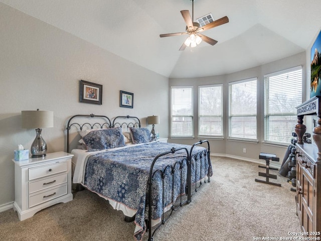 bedroom with lofted ceiling, light colored carpet, and ceiling fan