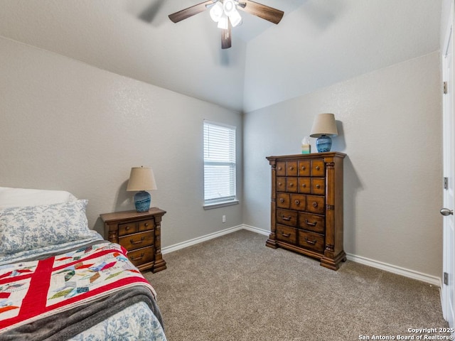 carpeted bedroom with ceiling fan and vaulted ceiling