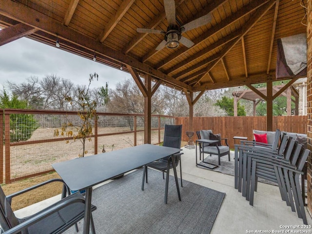 view of patio with a gazebo and ceiling fan