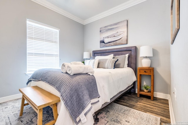 bedroom with hardwood / wood-style flooring and ornamental molding