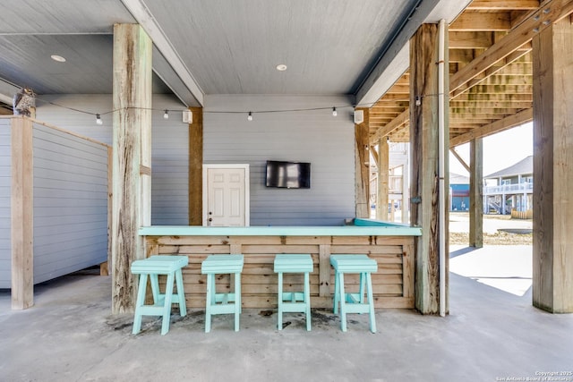 view of patio / terrace featuring exterior bar