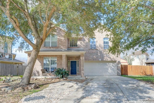 view of front of property with a garage and a porch