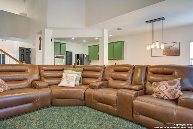 carpeted living room featuring sink