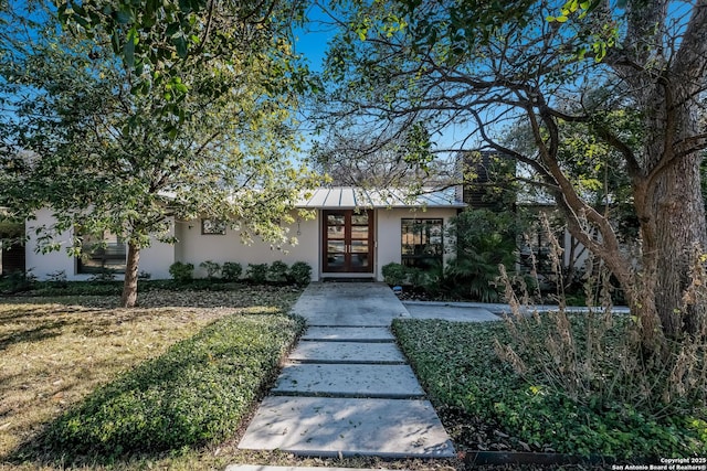 view of front of home with a front yard