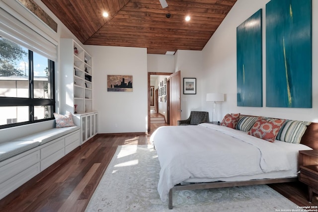 bedroom with wood ceiling, lofted ceiling, and dark hardwood / wood-style flooring