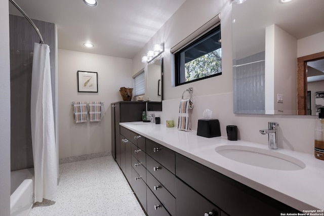 bathroom with vanity and shower / bath combination with curtain