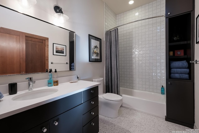 full bathroom featuring toilet, vanity, and shower / bathtub combination with curtain