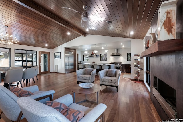 living room featuring dark wood-type flooring, ceiling fan with notable chandelier, lofted ceiling with beams, and wooden ceiling