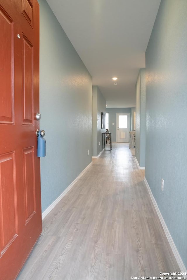 hall featuring light hardwood / wood-style floors