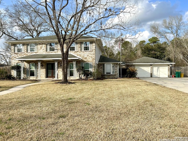 view of front of home featuring a garage and a front yard