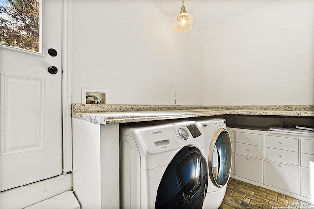 laundry area with washer and dryer