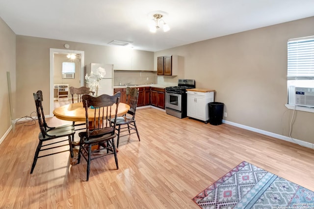 dining room featuring light hardwood / wood-style flooring