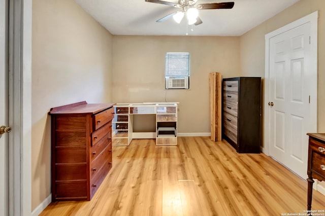 office space featuring ceiling fan and light hardwood / wood-style floors