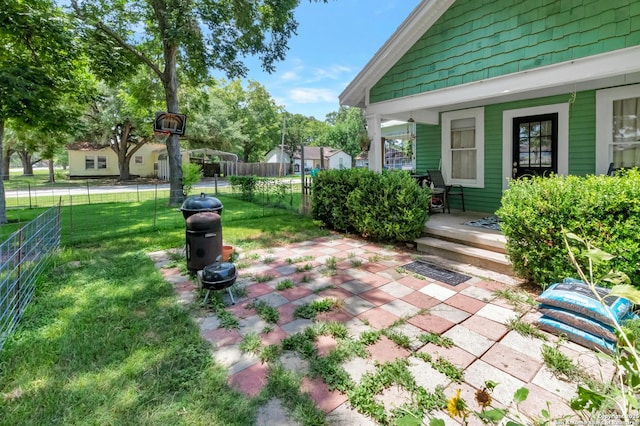 view of yard featuring a porch