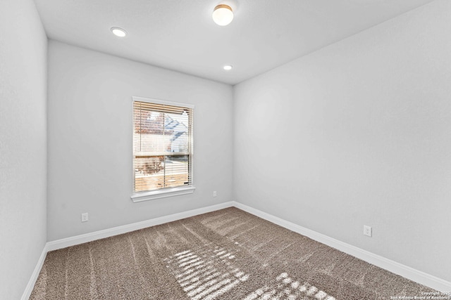 unfurnished room with carpet floors