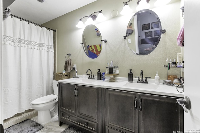 bathroom featuring vanity, toilet, and walk in shower