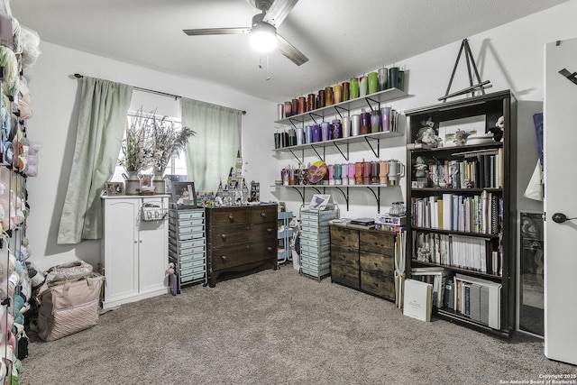 interior space with ceiling fan and light carpet