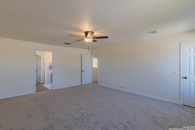 empty room with light carpet and ceiling fan