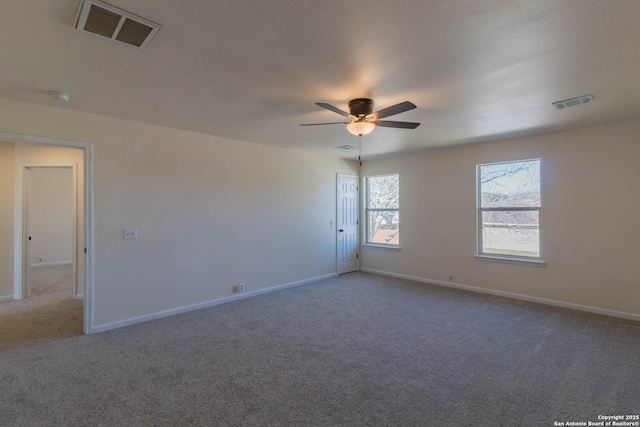 carpeted empty room with ceiling fan