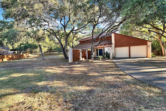 front of property with a garage