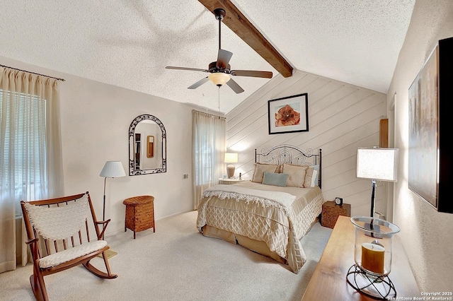 bedroom featuring multiple windows, vaulted ceiling with beams, light colored carpet, and a textured ceiling