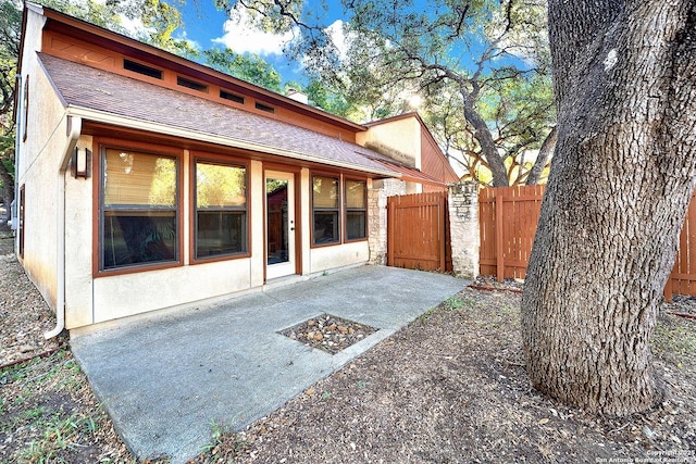 rear view of property with a patio area