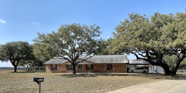 view of front facade featuring a carport