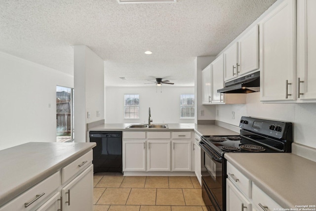 kitchen with ceiling fan, white cabinets, sink, and black appliances