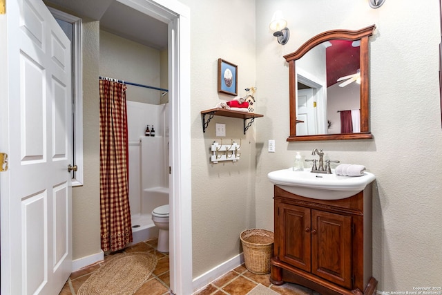 bathroom featuring vanity, tile patterned flooring, and walk in shower