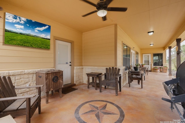 view of patio with ceiling fan