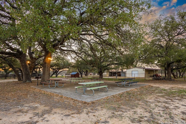 view of yard at dusk