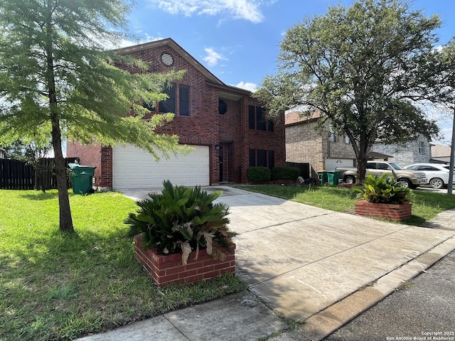 view of front of home featuring a garage and a front lawn