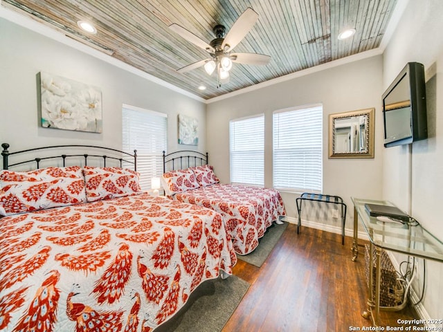 bedroom with ceiling fan, ornamental molding, dark hardwood / wood-style flooring, and wooden ceiling