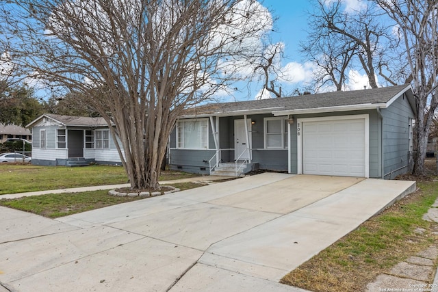 ranch-style house featuring a garage and a front yard