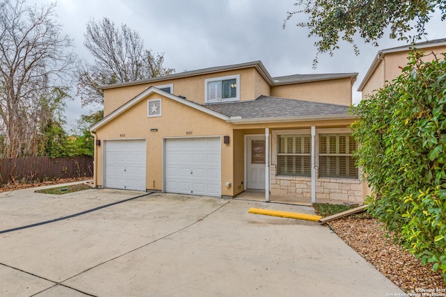 front of property with a garage