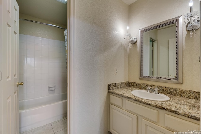 bathroom featuring shower / bath combination with curtain, vanity, and tile patterned floors