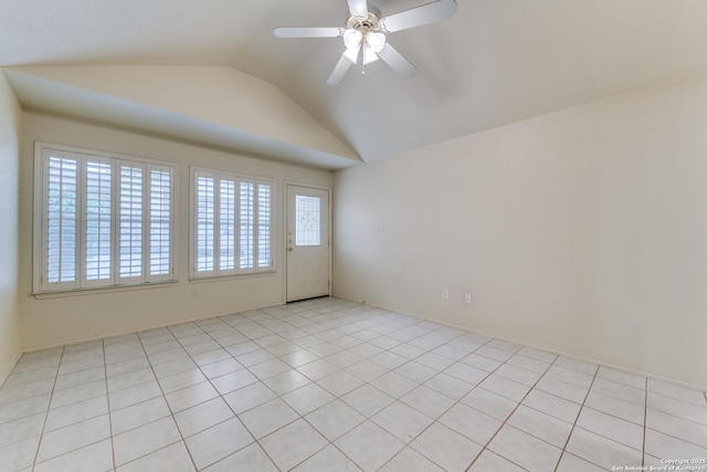 spare room featuring lofted ceiling and ceiling fan