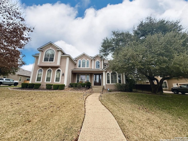 view of front of house with a front lawn