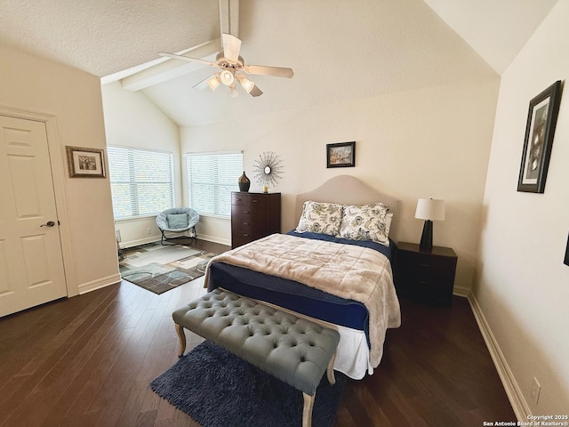 bedroom with vaulted ceiling with beams, dark hardwood / wood-style floors, and ceiling fan