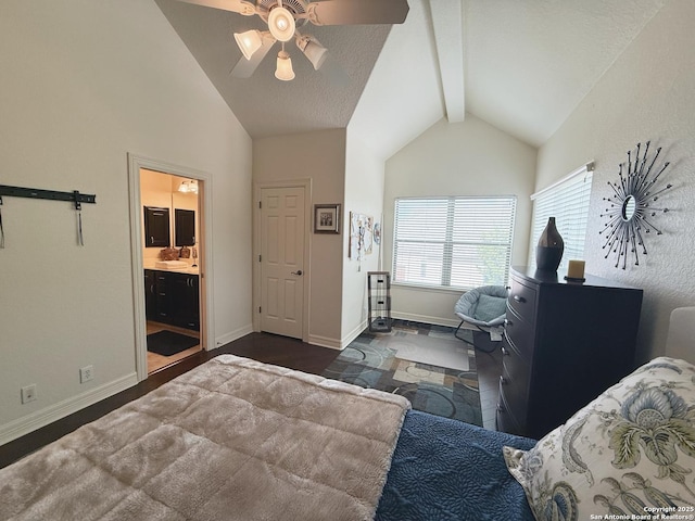 unfurnished bedroom with ceiling fan, a barn door, high vaulted ceiling, and beam ceiling